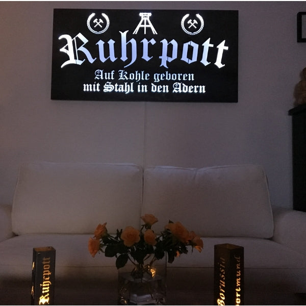 Schild "Ruhrpott - Auf Kohle geboren mit Stahl in den Adern"