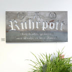 Schild "Ruhrpott - Auf Kohle geboren mit Stahl in den Adern"
