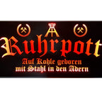 Schild "Ruhrpott - Auf Kohle geboren mit Stahl in den Adern"