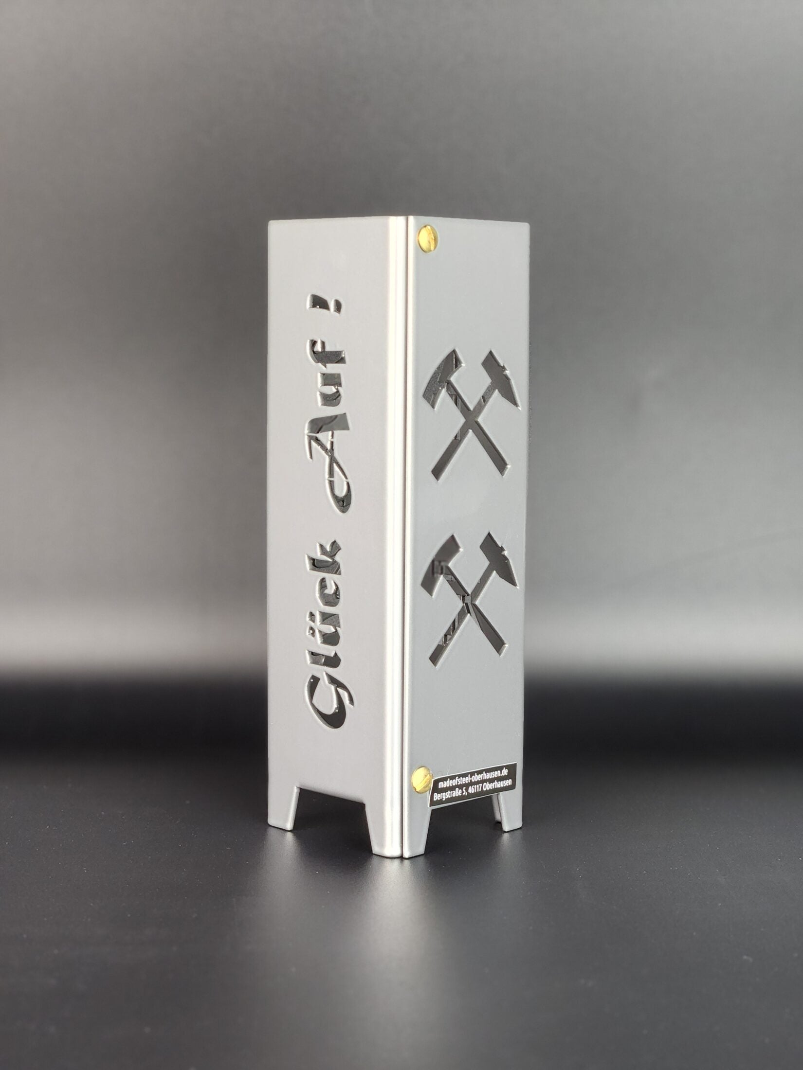 Teelicht Bottrop aus Metall mit Schriftzug Glück auf und Symbol Eisen Schlägel in Brilliant silber pulverbeschichtet