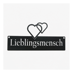 Schwarzes Wandschild aus Metall mit Schriftzug „Lieblingsmensch“ und Herzen